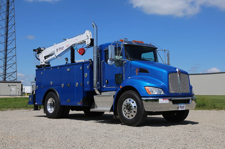A blue TMAX 2 mechanic truck facing to the right