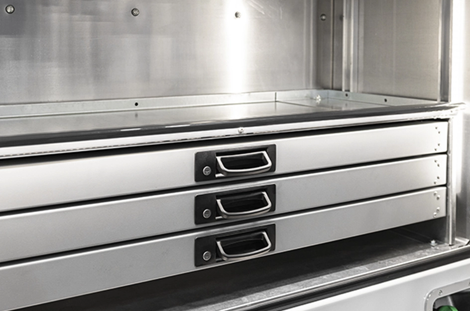 Three rows of toolbox drawers on a TMAX truck body