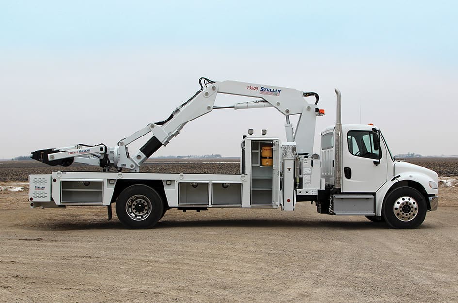 TM6116/13500 Large OTR Tire Service Truck, right-side view with open tool compartments