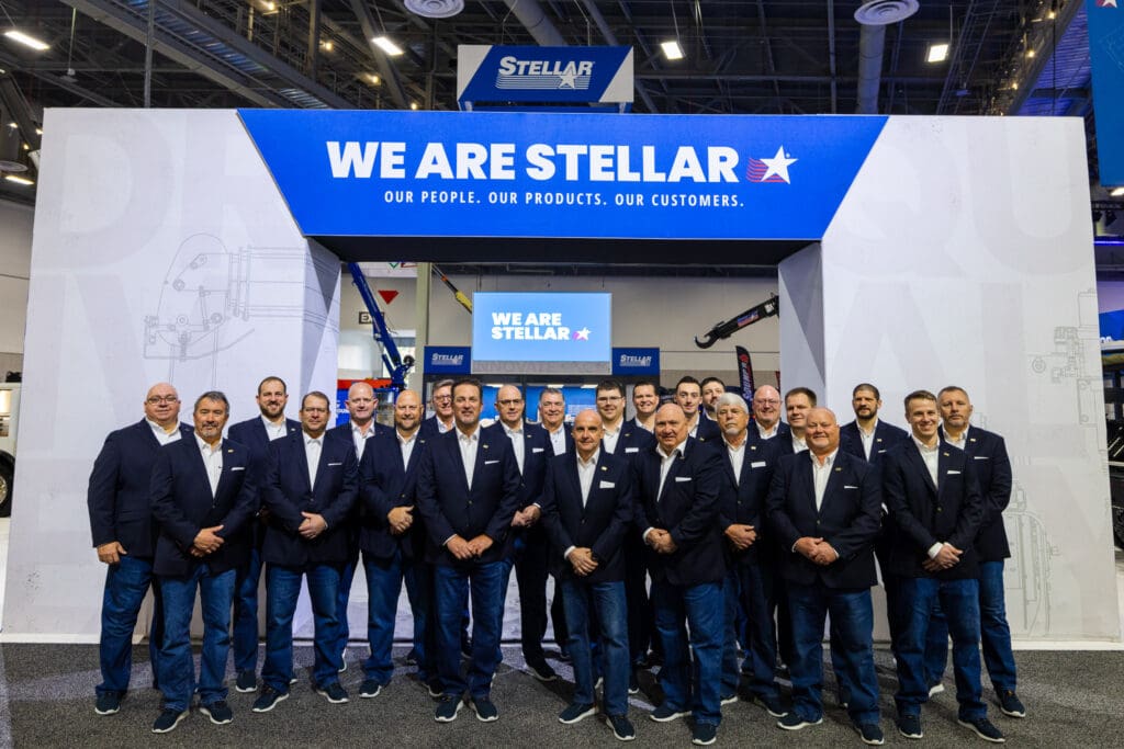 Team standing in front of Stellar booth at CONEXPO 2023