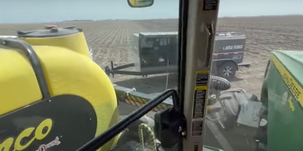 View of a deluxe fuel trailer from inside of a large piece of farm equipment