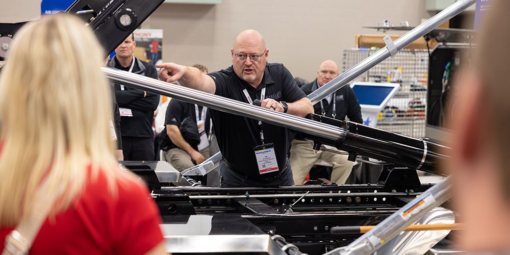 Tim Worman doing a product demonstration at a trade show.