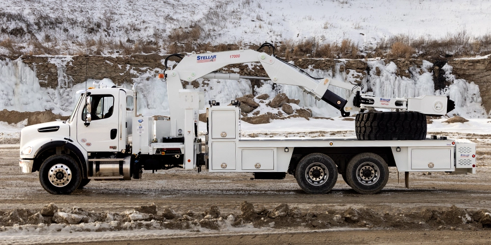 TM16160 28000 OTR tire truck in a stone quarry.