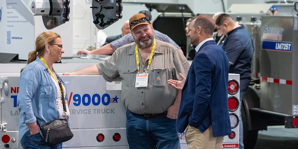 Stellar employee speaking with customers at CONEXPO 2026.