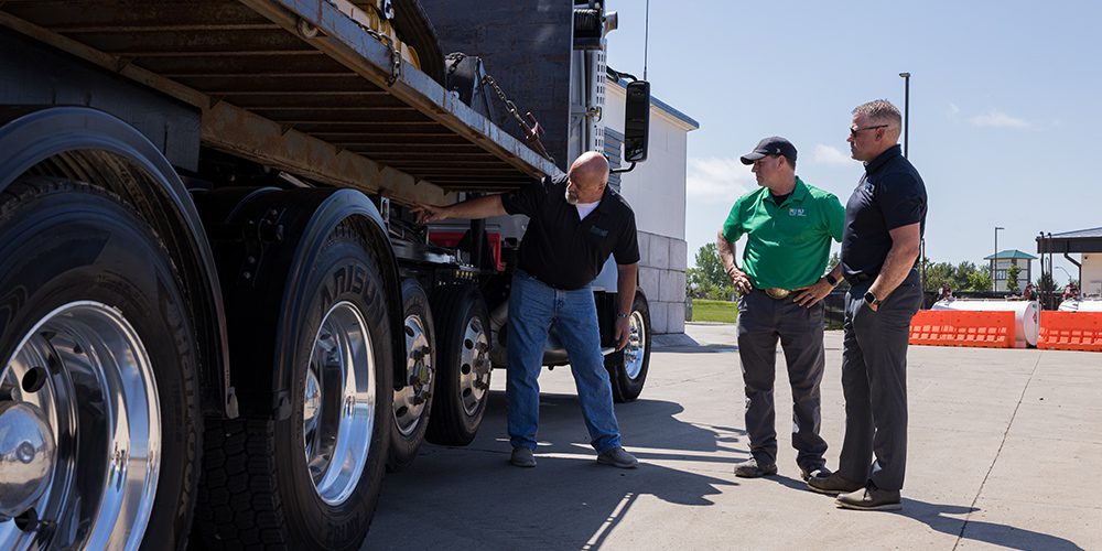 Stellar Regional Sales Manager demonstrating hooklift features to customers